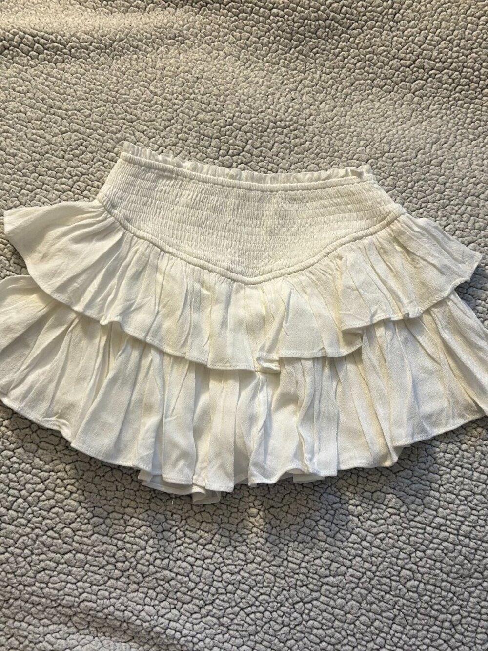 Rock n Rags -- white ruffle mini skirt, elastic waistband, built in shorts under